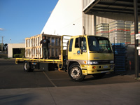 A truck moving pallets
