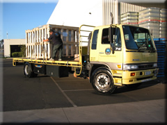 A truck moving pallets